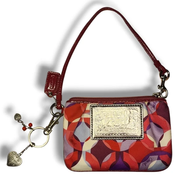 Coach Wristlet with charms, like NEW!! - Picture 1 of 8
